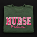 Forest green embroidered Nurse Practitioner sweatshirt with pink lettering, size small