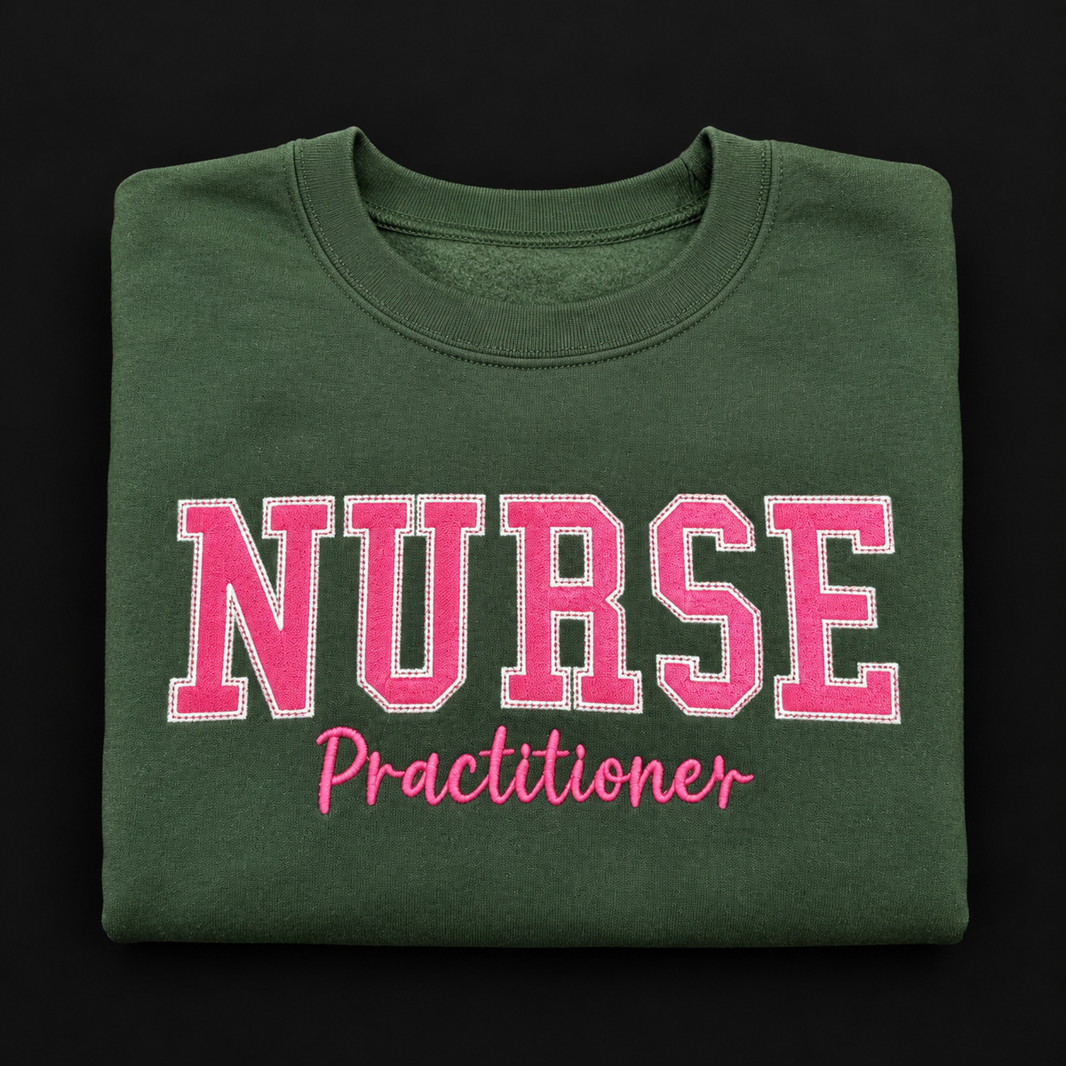 Forest green embroidered Nurse Practitioner sweatshirt with pink lettering, size small
