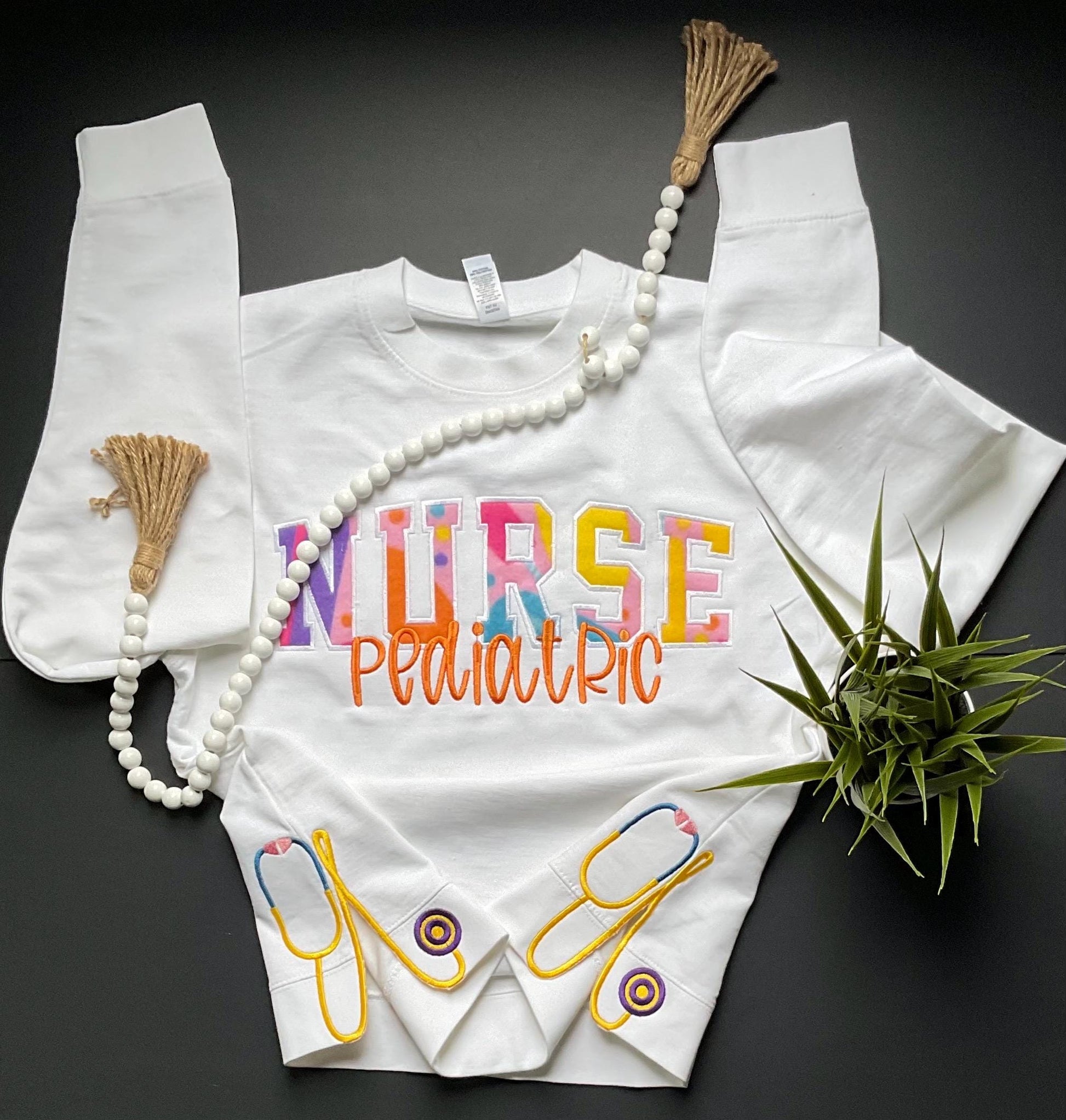 Nurse Sweatshirt with fabric appliqué and side bow stethoscopes!