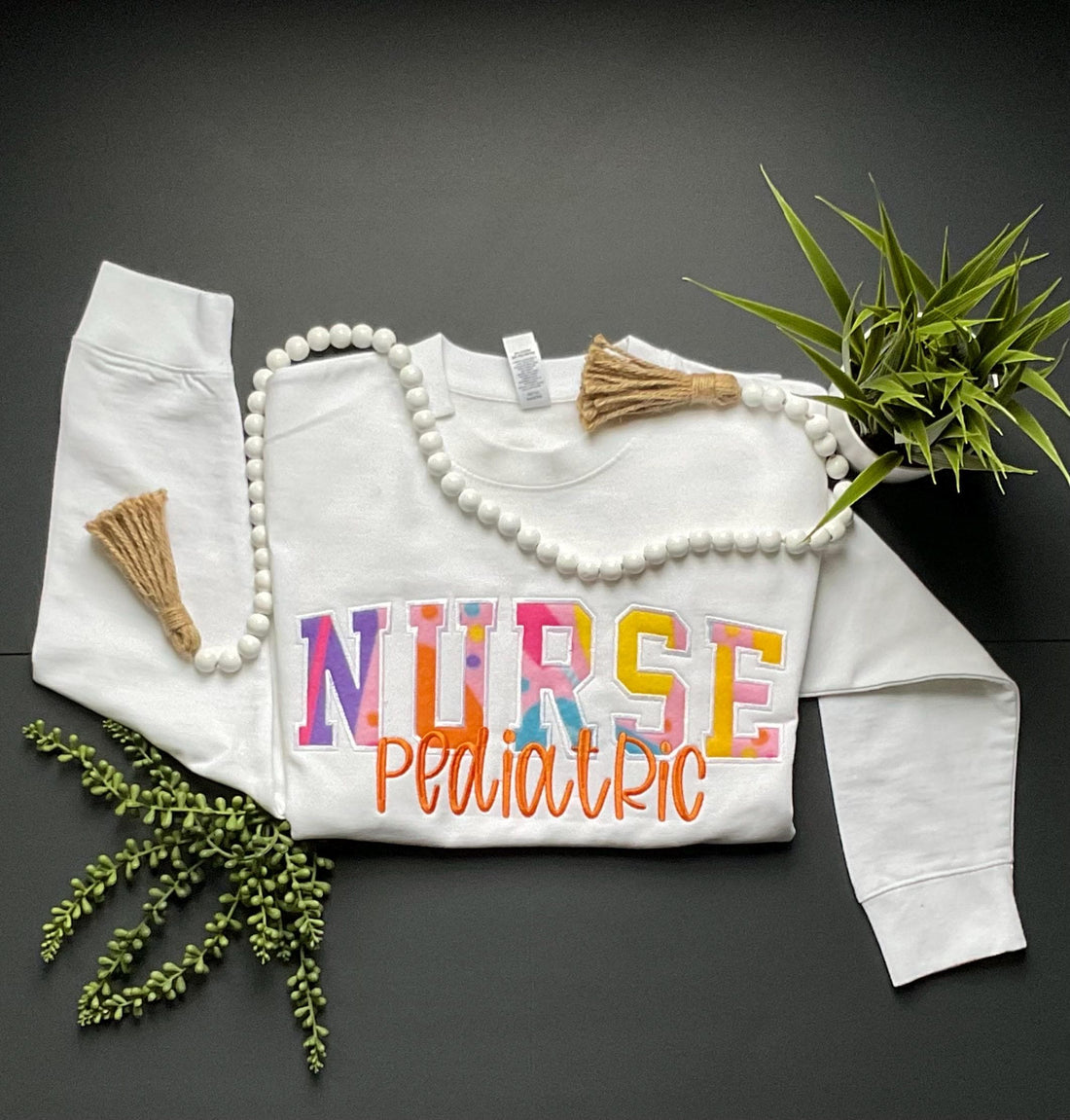 Nurse Sweatshirt with fabric appliqué and side bow stethoscopes!
