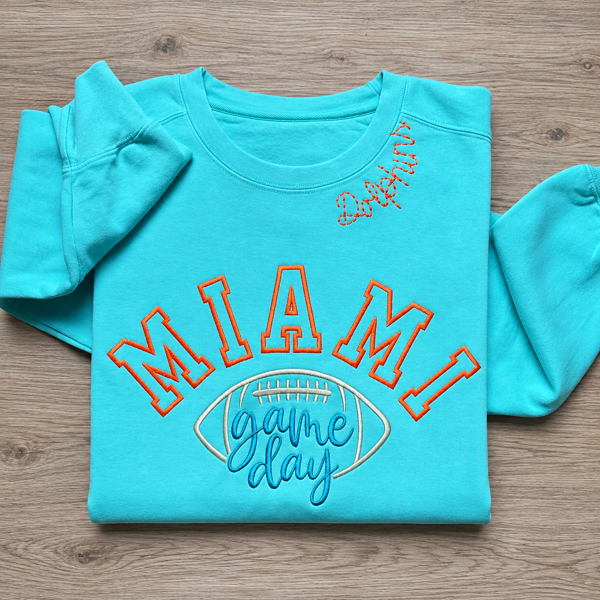 Turquoise embroidered Miami Game Day football sweatshirt, size medium
